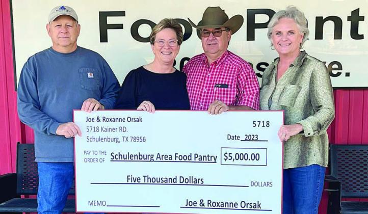 Joe and Roxanne Orsak (center) donated $5,000 to the Schulenburg Area Food Pantry recently. The Orsaks continue to support the Food Pantry and their donations have allowed the pantry to purchase non-perishable food and household items needed to keep the shelves stocked. Accepting donation were Jack Niesner (left) Food Pantry vice president, and Debra Blansitt (right), Food Pantry president.