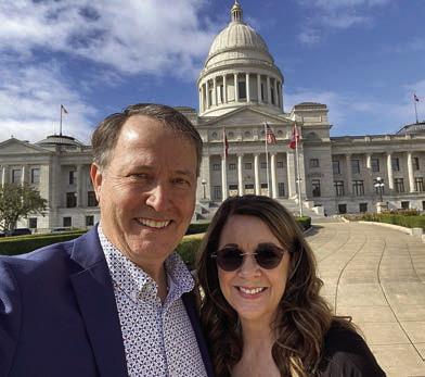 Jim Schmidt, legislative ambassador and executive team member for the National School Chaplain Association, stands before the Arkansas State Capitol with his wife Sheila. Jim Schmidt is from Schulenburg.