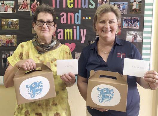 Baked Goods – St. Rose of Lima Catholic School, represented by Jeannie Mican (right), received baked goods from Senior Connections, represented by Stephanie Shroyer (left).