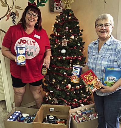 Schulenburg Family Fitness Center recently held a food drive benefiting the Schulenburg Area Food Pantry. The Fitness Center staff and members donated 126 pounds of nonperishable food. Schulenburg Family Fitness Center remembers the true meaning of Christmas and wishes everyone love and good health this Christmas season. Shown are (from left) Deannie Crim, gym manager, and Louise Berger, Schulenburg Area Food Pantry volunteer.