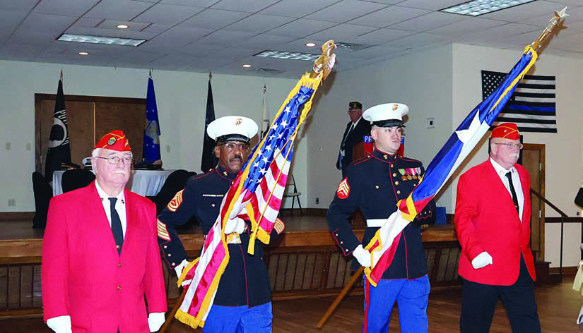 Posting and retrieving colors are (from left) Richard Chance, Willie Matthews of Schulenburg, Montana Olle of Schulenburg, and David Wyman. Photo By Melanie Berger / Courtesy of Flatonia Argus