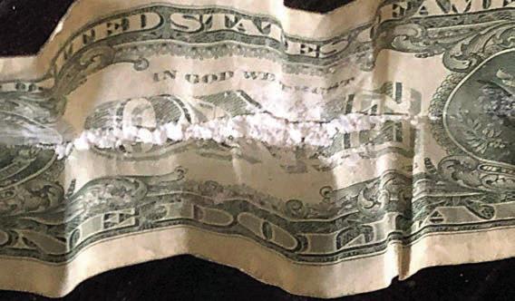 SPD officers found cocaine hidden in a folded dollar bill during a call on Sunday morning that led to the arrest of a Schulenburg man.