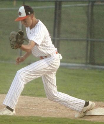 Van Prihoda receives a throw to complete a 1-6-3 (pitcher-to-shortstop-to-first baseman) double play last Thursday. Sticker Photo By Darrell Vyvjala