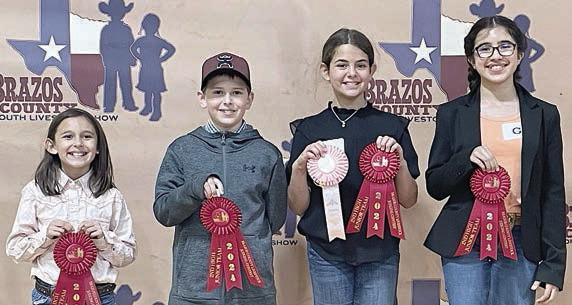Reserve Champion Junior Team – (from left) Emma Zweschper, Hudson Holub, Adalyn Carrales and Avah Noreiga. Emma Zweschper, Hudson Holub and Avah Noriega are members of the Schulenburg 4-H.