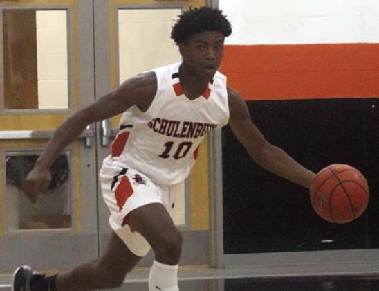 Da’Terrion Houston heads upcourt after a steal in the fourth quarter of the Horns’ win Saturday. Sticker Photo By Darrell Vyvjala