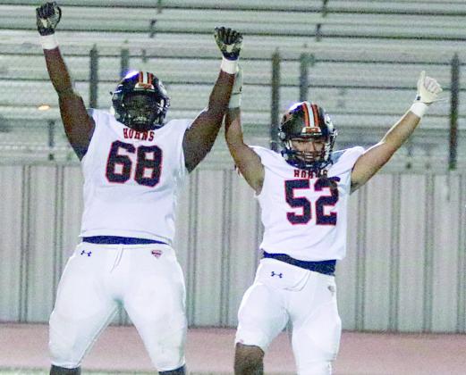 Ricky Walton (left) and Austin Toro show off their moves with a victory dance after defeating Three Rivers. Sticker Photo By Darrell Vyvjala