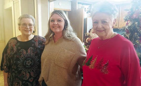 Hostesses, judge – Janet Kobza (left) and Patricia Greeson (right) were hostesses while Kylee Zapalac (center) judged the table decorating contest.