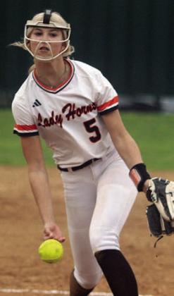 Kinley Tillery delivers a strikeout pitch in the second inning. Sticker Photo By Darrell Vyvjala
