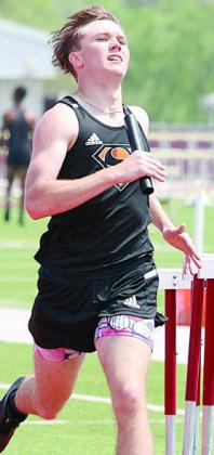 Nick Goode heads to the finish line on the last leg of the 1600-meter relay. Photo By Melanie Berger / Courtesy of Flatonia Argus
