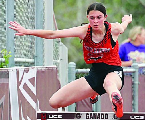 Ava Faith clears a hurdle in the 100-meter event. Photo By Melanie Berger / Courtesy of Flatonia Argus
