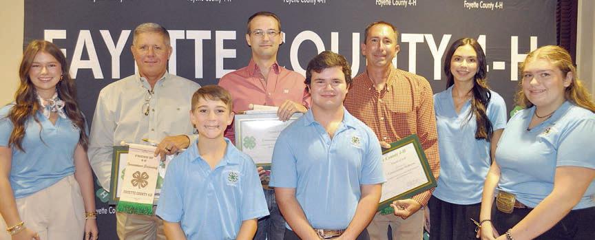 Friend of 4-H Award – Fayette County Commissioners Court, with the award presented by 4-H Council officers. Shown are (front row, from left) Council officers Crockett Guenther, Logan Poncik and Rheagan Karisch; (back row) Council officer Harper Mau; Commissioner Harvey Berckenhoff, Commissioner Clint Sternadel and Commissioner Jason McBroom; and Council officer Tori Newton. Now shown are Judge Dan Mueller and Commissioner Drew Brossmann.
