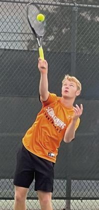 Shorthorn junior Caden Herzik serves at the state tournament last week.