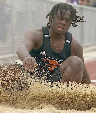 Rodney H Walton splashes down to win the long jump. He also placed first in the triple jump. Photo By Melanie Berger / Courtesy of Flatonia Argus