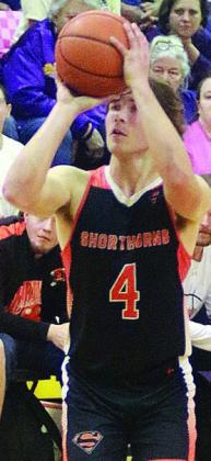 Jayse Janda hits a trey in the fourth quarter against the Comanches. Sticker Photo By Darrell Vyvjala
