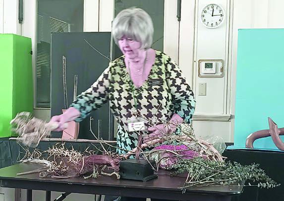 Speaker Bonnie Baker conducted a workshop on floral design.