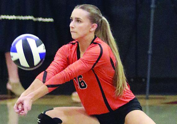 Jenna Guentert gets a dig in set one. Sticker Photo By Darrell Vyvjala
