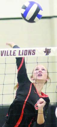 Clara Magliolo puts a swing on a third-set attack. Sticker Photo By Darrell Vyvjala