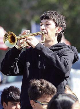 Schulenburg ISD band student Colton Knigge played “Taps” after the Triple Volley Salute.