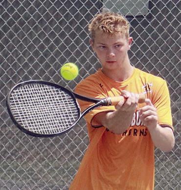 Caden Herzik sends over a forehand winner at state. Sticker Photos By Darrell Vyvjala