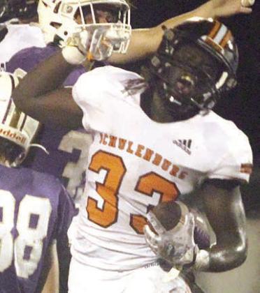 Rodney H Walton celebrates after coming up with a fumble recovery in the second quarter. Sticker Photo By Darrell Vyvjala