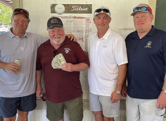 Second Flight, Second Place (6 under par / 66) – (from left) Bruce Wagner, Mike Kuhn, Mike Tofte, and Todd Froebel. Sticker Photo By Darrell Vyvjala