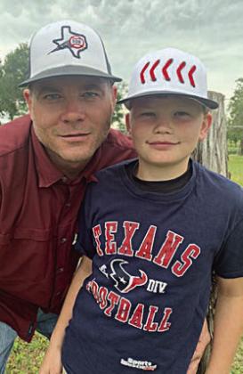 Cullen Mikulencak of Moulton ISD with his dad, Jonathan Mikulencak.