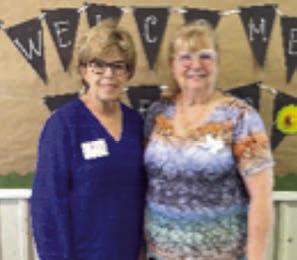 Also attending the District 11 TEEA Spring Conference were Sally Garrett (left), Extension agent, and Janice Alexander (right), Fayette County EEA Council treasurer.
