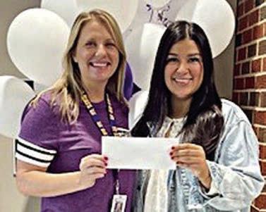 Weimar Junior High Teacher Grant Recipient – Jill Morrison (left). Representing Stanzel Family Foundation, Melanie Ramirez (right).