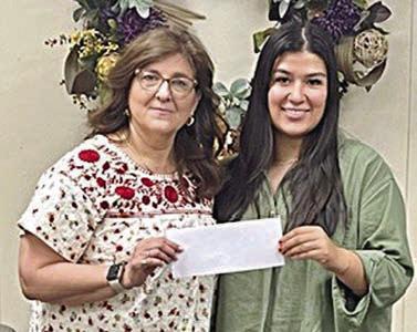Weimar High School Teacher Grant Recipient – Melissa Clark (left). Representing Stanzel Family Foundation, Melanie Ramirez (right).