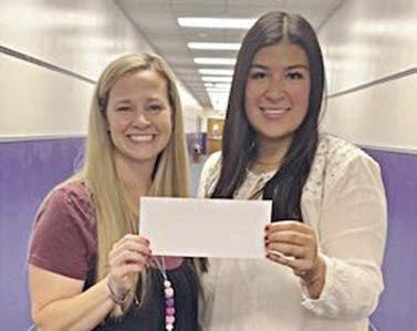 Weimar Elementary Teacher Grant Recipient – Julianne Kreger (left). Representing Stanzel Family Foundation, Melanie Ramirez (right).