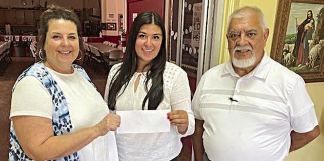 St. Rose Catholic School Teacher Grant Recipients – Donna Kunz (left) and Julius Castillo (right). Representing Stanzel Family Foundation, program director Melanie Ramirez (center).