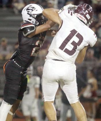 Brandon Vineyard pressures Truett Fry into an incompletion in the fourth quarter.