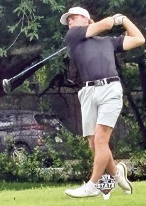 Reid Janda finishes a swing on a drive last Monday at Lions Municipal Golf Course in Austin.
