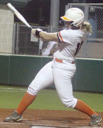 Summer Livingston follows through on a swing that plated the Lady Horns’ only run against Charlotte. Sticker Photo By Darrell Vyvjala