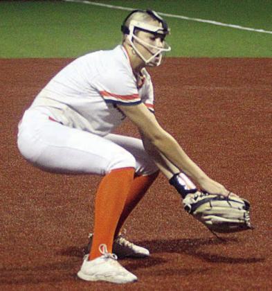 Pitcher Kinley Tillery fields a bunt for an out Friday night. Sticker Photo By Darrell Vyvjala