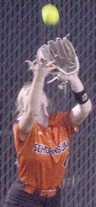 Left fielder Angel Davis gets under a fly ball during Thursday night’s game. Sticker Photo By Darrell Vyvjala