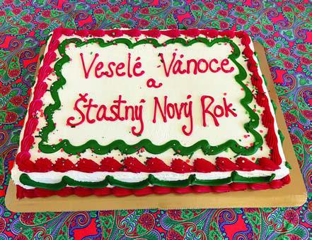 Written in Czech on a cake are “Merry Christmas and a Happy New Year.”