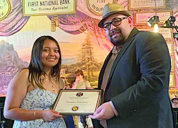 Honor Band – Yahaira Guerrero (left) received a certificate for selection into the Texas A&amp;amp;M Commerce Junior/Senior Honor Band from Justin Bartlett (right).