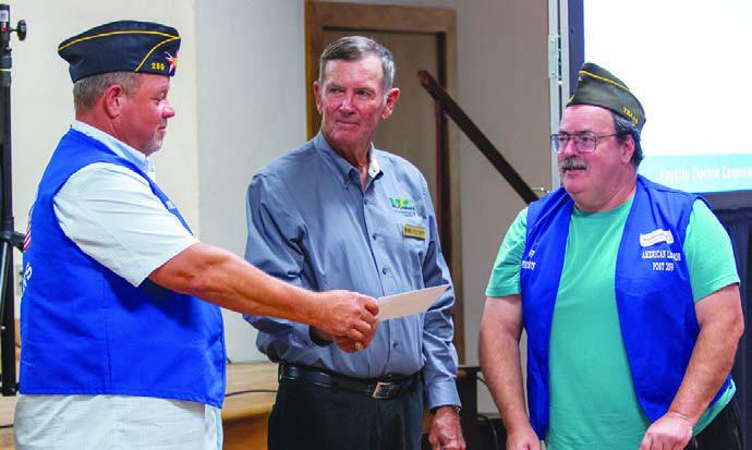 Veterans Memorial Park of Weimar received a $5,000 grant from FEC and CoBank. Shown are (from left) Doug Beddingfield representing Veterans Memorial Park, FEC board president David Lehmann and Raymond Adams representing Veterans Memorial Park.
