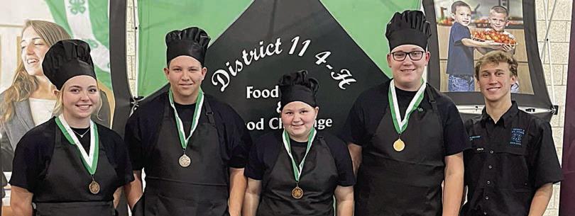 Last Minute Cookers – (from left) Peyton Gilchrest, Railey Nieto, Brealey Nieto and Josh Vrana of the Flatonia 4-H and a District 11 4-H Council officer.