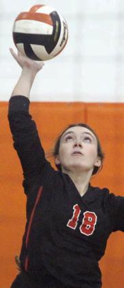 Keaton Walker serves one of her three straight aces in game three versus the Maidens. Sticker Photo By Darrell Vyvjala