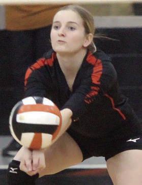 Madison Kunschick sends a pass on its way in game two on Oct. 10. Sticker Photo By Darrell Vyvjala