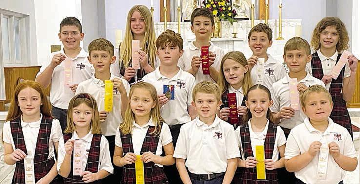 Grades 1-4 Winners – (front row, from left) Rowan Heinrich, Harper Wright, Ellie Klein, Benjamin Sustr, Ree Lichnovsky, Myles Krenek, (middle row) Tripp Brown, Adam Reeves, Emileigh Divin, Kasen Zbranek, (back row) Hudson Holub, Adelyn Hollas, Micah Garcia, Brody Lewis and Lane Schiffli.
