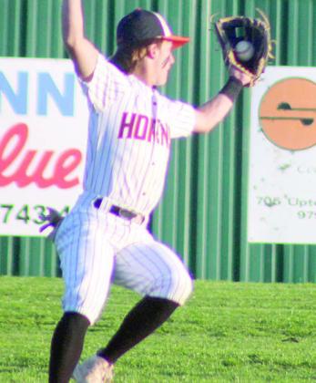 Horns suffer extra-inning loss