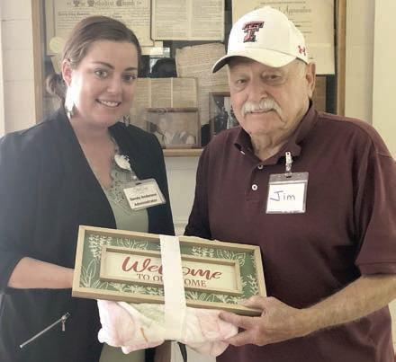 Winning the blackout bingo prize in Flatonia on Tuesday, Sept. 10 was Jim Walker (right) of Columbus, who comes to all three Senior Connections campuses. Caller that day was Sandy Anderson (left) of True Care Living Center in Columbus.