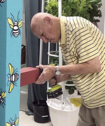 Helping cap off a few garden poles was Lee Ehler – he is pretty handy!