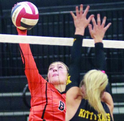 Greenli Van Zandt sends over one of her five kills in the third set. Sticker Photo By Darrell Vyvjala