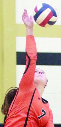 Landry Zapalac serves one of her six points in game three. Sticker Photo By Darrell Vyvjala