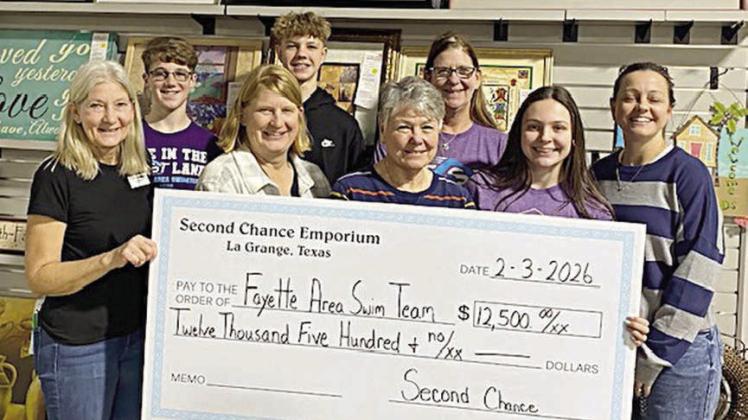 Swim team gets $12,500 from Second Chance