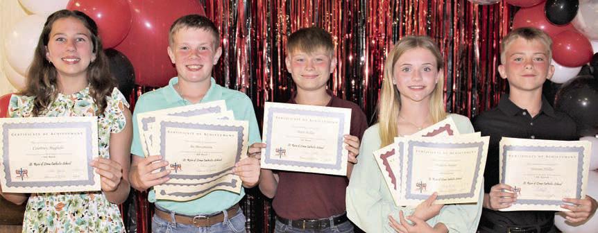 Top 6th Grade Students – (from left) Courtney Magliolo, band most improved; Bo Brossmann, math, reading, science and social studies; Brett Hollas, band; Mallory Bonner, reading, English and religion; and Weston Hollas, math, reading, band and speech.